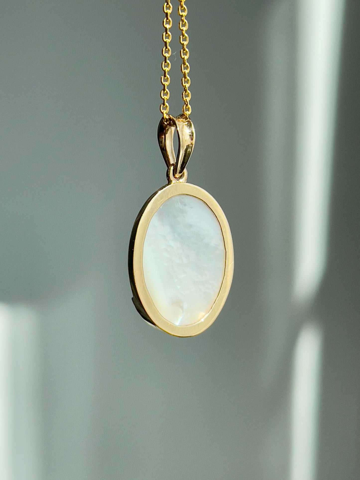 Mother of Pearl Oval Cabochon Buddha Pendant 18k Gold