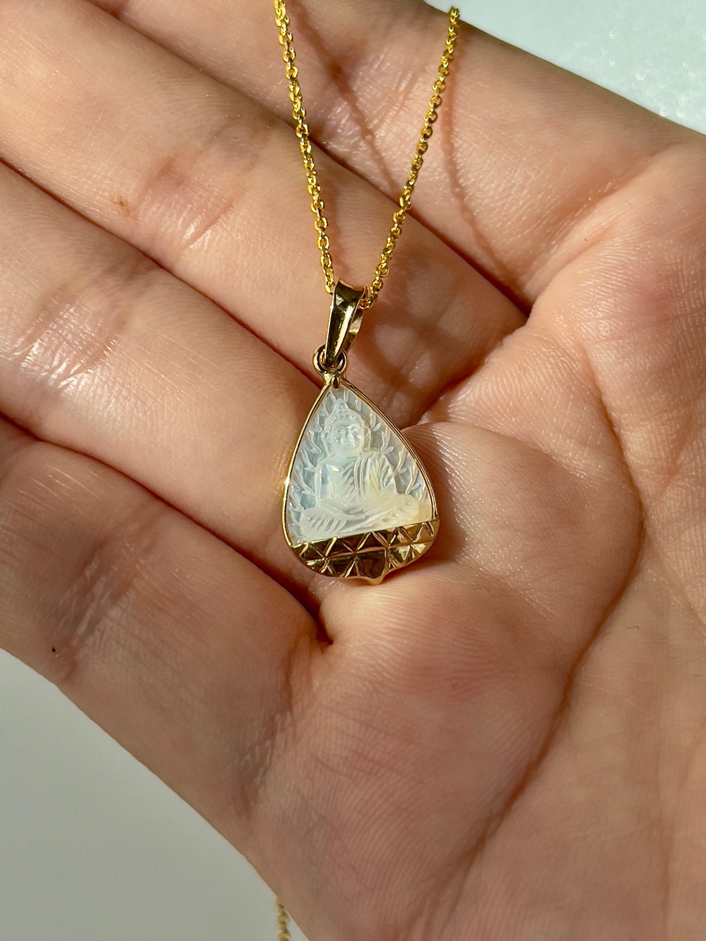 Mother of Pearl Banyan Leaf Buddha with Gold Lotus Pendant 18k Gold