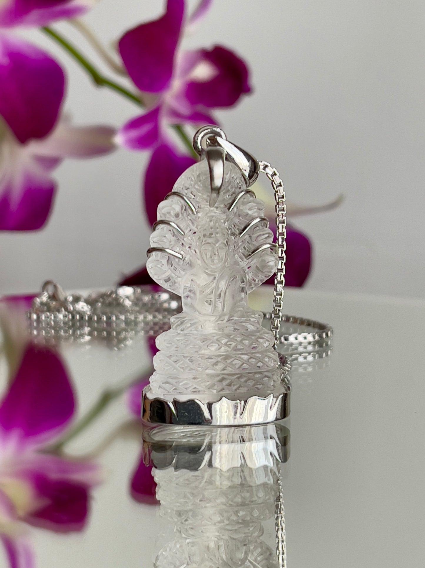 Clear Naga Buddha in Silver with Lotus Motif